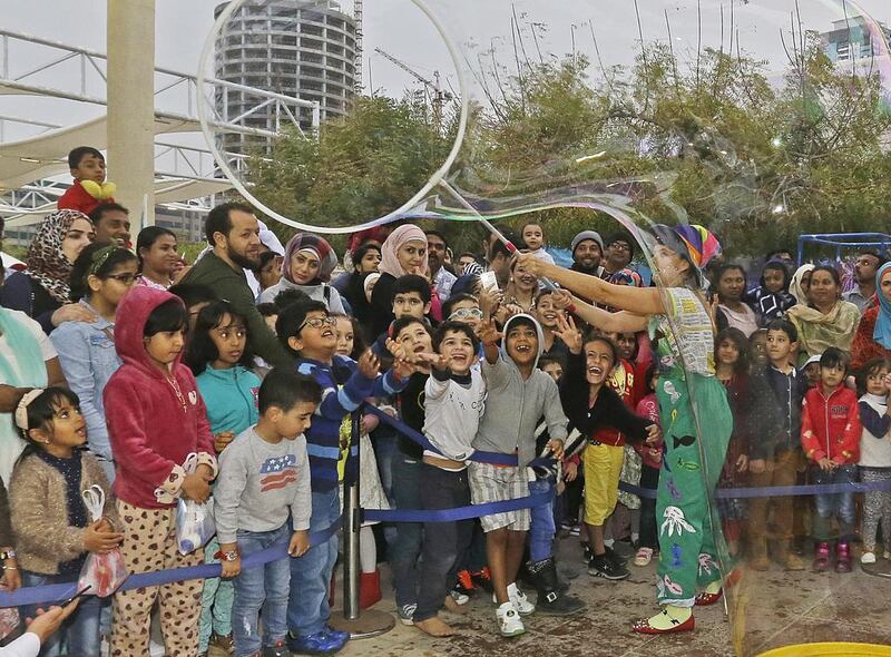 Young and old alike enjoy the Bubble Show at the Sharjah Aquarium Carnival. There are live performances, workshops, children’s play areas and interactive learning experiences at the free event. Jeffrey E Biteng / The National