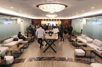 DUBAI, UNITED ARAB EMIRATES , Feb 10  – 2020 :-  Guests during the opening of Kiklabb at the Queen Elizabeth 2 in Dubai.  Kiklabb offers private offices, co-working spaces and flexi desks. (Pawan  Singh / The National) For News. Story by Nick Webster