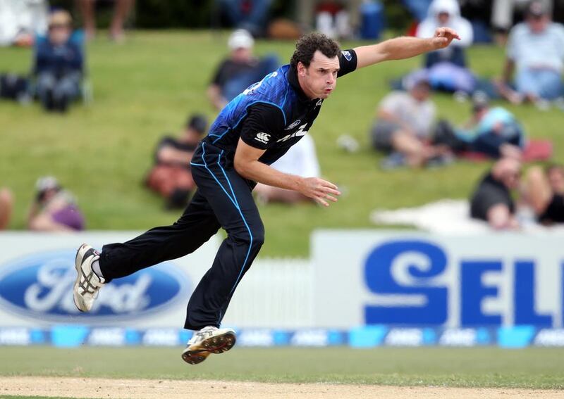 A groin injury is sending pace bowler Kyle Mills back to New Zealand to undergo additional tests and treatment. Michael Bradley / AFP


