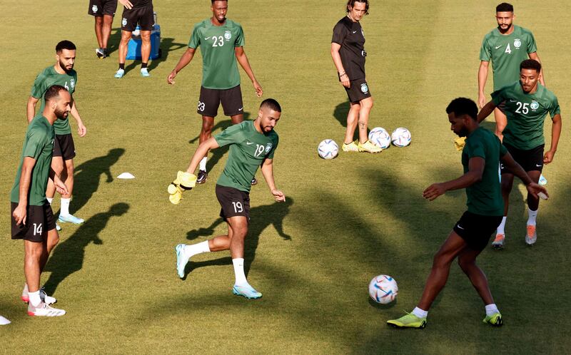 Saudi Arabi Hatan Babhir and teammates attend a training session at the Sealine Training Site. AFP