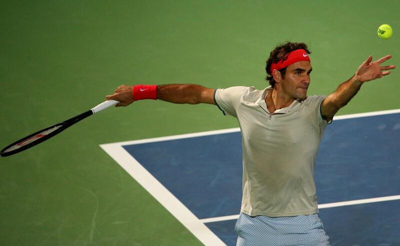 Roger Federer serves to Radek Stepanek in the second round. The Swiss faced stiff competition from the Czech player who took a set off the former world No 1. Marwan Naamani / AFP