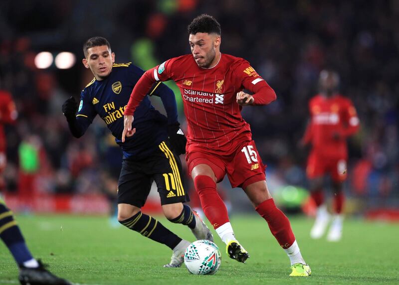 Liverpool's Alex Oxlade-Chamberlain (right) and Arsenal's Lucas Torreira battle for the ball during the Carabao Cup, Fourth Round match at Anfield, Liverpool. PA Photo. Picture date: Wednesday October 30, 2019. See PA story SOCCER Liverpool. Photo credit should read: Mike Egerton/PA Wire. RESTRICTIONS: EDITORIAL USE ONLY No use with unauthorised audio, video, data, fixture lists, club/league logos or "live" services. Online in-match use limited to 120 images, no video emulation. No use in betting, games or single club/league/player publications.