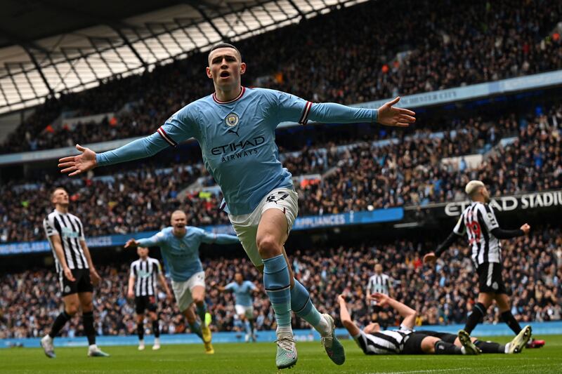 Phil Foden celebrates after scoring the opening goal in Manchester City's 2-0 Premier League victory over Newcastle United at the Etihad Stadium on March 4, 2023. AFP