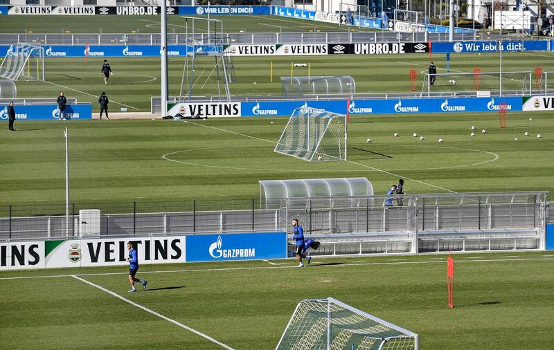 Schalke players take part in drills at the club's training ground in Gelsenkirchen while maintaining social distancing due to the coronavirus outbreak. AP Photo