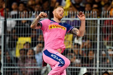 Rajasthan Royals cricketer Ben Stokes jumps to attempt a catch at the boundary line during the 2019 Indian Premier League (IPL) Twenty 20 cricket match between Kolkata Knight Riders and Rajasthan Royals at the Eden Gardens Cricket Stadium, in Kolkata, on April 25, 2019. (Photo by DIBYANGSHU SARKAR / AFP) / ----IMAGE RESTRICTED TO EDITORIAL USE - STRICTLY NO COMMERCIAL USE-----