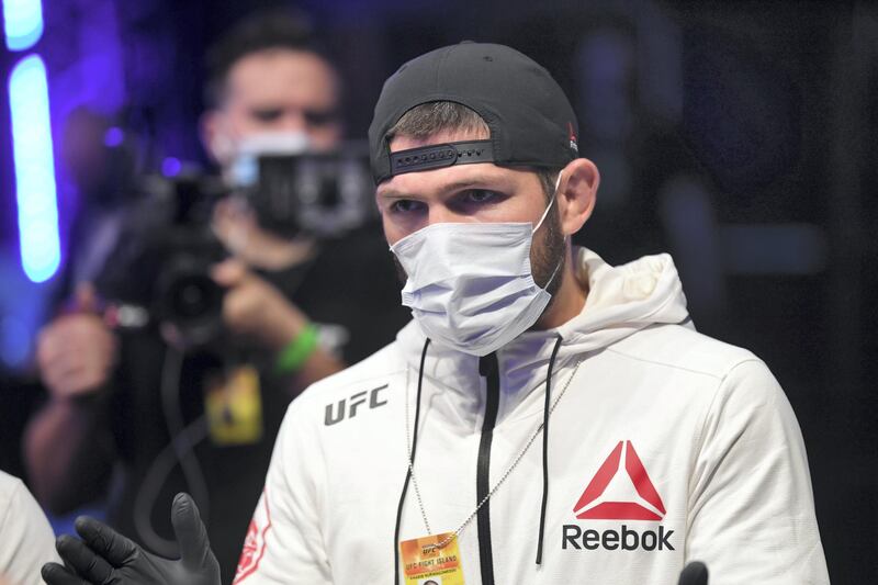 ABU DHABI, UNITED ARAB EMIRATES - SEPTEMBER 27:  Khabib Nurmagomedov corners Zubaira Tukhugov of Russia before facing Hakeem Dawodu of Canada in their featherweight bout during UFC 253 inside Flash Forum on UFC Fight Island on September 27, 2020 in Abu Dhabi, United Arab Emirates. (Photo by Josh Hedges/Zuffa LLC)