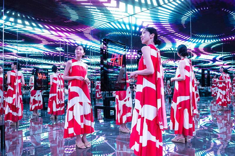 An immersive fitting room in Myeongdong, a bustling international shopping district in Seoul, South Korea. EPA