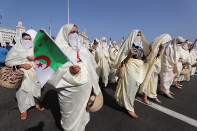 Algerian women in traditional costume during a parade held on the eve of the 31st Arab summit in Algiers. EPA