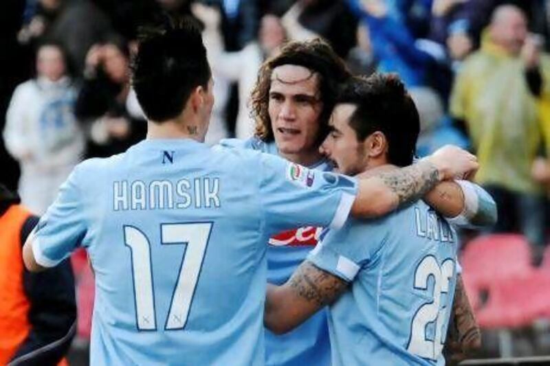 The trio of Marek Hamsek, left, Edinson Cavani, centre, and Ezequiel Lavezzi are a well-oiled, prolific unit.