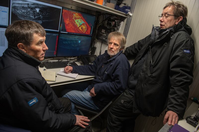 (L-R) John Shears, expedition leader, Mensun Bound, director of exploration and Nico Vincent, expedition subsea manager in the control room, from where an AUV was operated to locate the shipwreck.