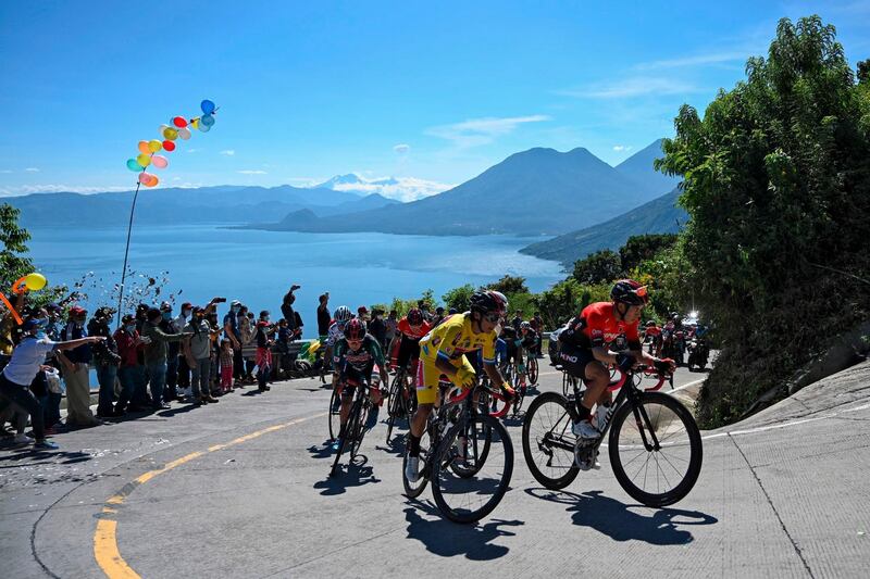 Guatemalan Mardoqueo Vasquez, wearing the leader's yellow jersey, competes during the Stage 8 of the Vuelta a Guatemala in San Pablo La Laguna, on Friday, October 30, 2020.  AFP