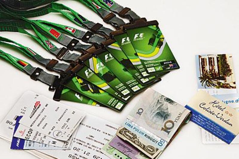 Some of the media passes, boarding tickets and currency Gary has used this year.