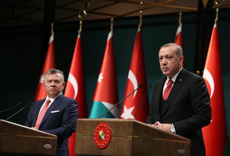 epa06371618 A handout photo made available by the Turkish Presidential Press Office shows Turkish President Recep Tayyip Erdogan (R) and Jordanian King Abdullah II (L) during a press conference in Ankara, Turkey, 06 December 2017. Reports state Jordanian King Abdullah II have said that Jerusalem is key to any Mideast peace agreement and to the stability of the entire region. US President Donald J. Trump has informed Palestinian leader Mahmoud Abbas that he intends to recognize Jerusalem as the Israeli capital and will relocate the US embassy from Tel Aviv to Jerusalem.  EPA/TURKISH PRESIDENTAL PRESS OFFICE HANDOUT  HANDOUT EDITORIAL USE ONLY/NO SALES