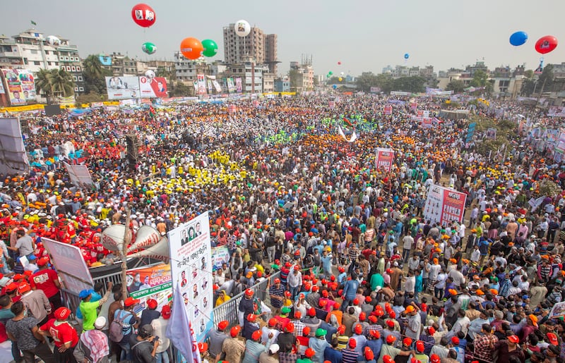 Supporters of the opposition Bangladesh Nationalist Party attend a rally at the Glopbagh field in Dhaka on December 10, 2022. EPA