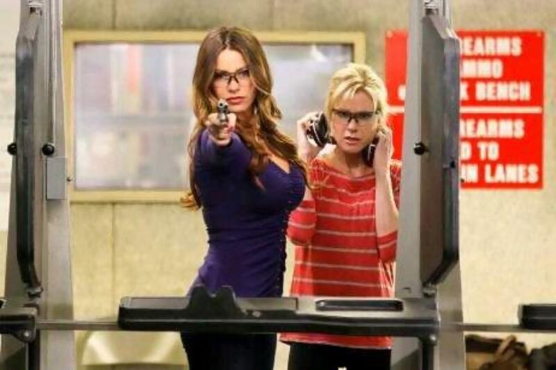 The actresses Sofia Vergara, left, and Julie Bowen are shown in a scene from the comedy series Modern Family.