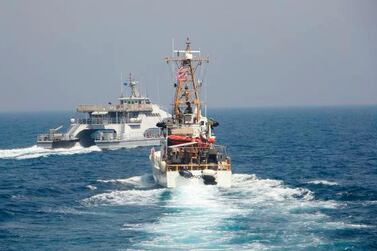 Tensions between the US and Iran are playing out at sea. AP