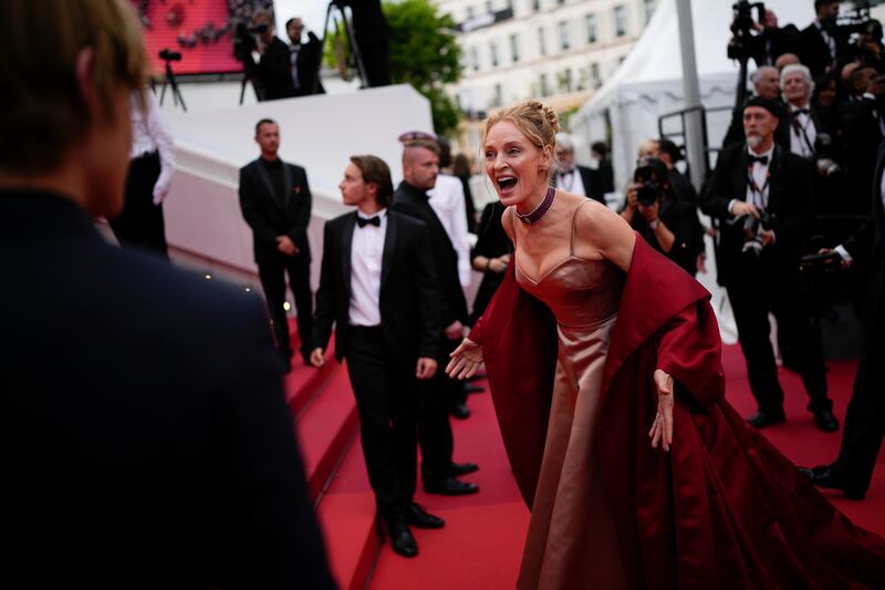 Uma Thurman poses for photographers upon arrival at the opening ceremony and the premiere of the film Jeanne du Barry. AP