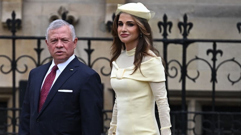 Jordan's King Abdullah II and Queen Rania arrive at Westminster Abbey for the coronation. AFP
