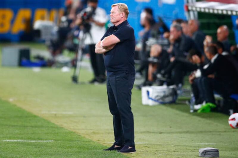 Ronald Koeman, coach of Barcelona, watches the match.