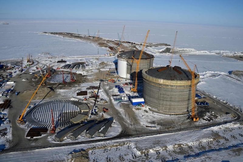 (FILES) This file photo taken on April 16, 2015 shows natural gas reservoirs under construction at the port of Sabetta in the Kara Sea shore line on the Yamal Peninsula in the Arctic circle, some 2450 km of Moscow.
Russia on December 05, 2017 launched the first terminal for liquefied natural gas project, Yamal LNG, in the Russian Arctic, Russian gas producer Novatek said. / AFP PHOTO / KIRILL KUDRYAVTSEV