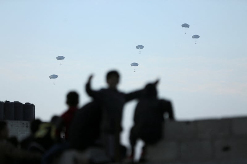 Aid is dropped into Gaza from US military aircraft. Reuters