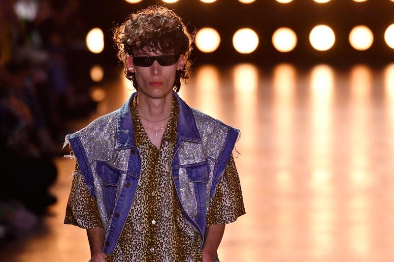 Leopard and landscapes of coconut tree patterns appeared on short sleeve shirts. AFP