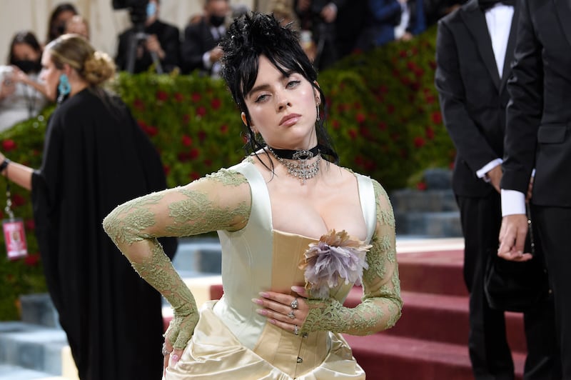 Billie Eilish clearly took her Met Gala inspiration directly from John Singer Sargent's Gilded Age portrait, with everything from her hair to her accessories emulating the glamour of Madame Paul Poirson. AP