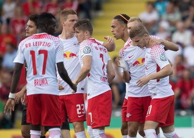 epa06142124 Leipzig's Marcel Sabitzer (C) celebrates his team's first goal with team mates during the German DFB Cup 1st round match between Sportfreunde Dorfmerkingen and RB Leipzig at Ostalb Arena in Aalen, Germany, 13 August 2017.  EPA/DANIEL KOPATSCH (ATTENTION: The DFB prohibits the utilisation and publication of sequential pictures on the internet and other online media during the match (including half-time). ATTENTION: BLOCKING PERIOD! The DFB permits the further utilisation and publication of the pictures for mobile services (especially MMS) and for DVB-H and DMB only after the end of the match.)