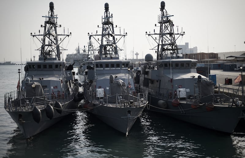US Navy ships at a base in the Bahraini capital Manama. AFP