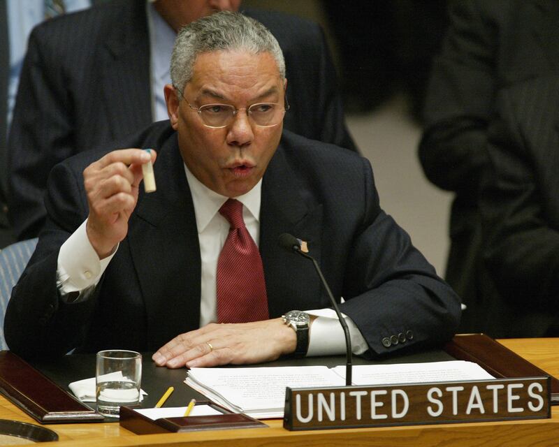 Colin Powell holds up a vial to illustrate Saddam Hussein’s alleged use of anthrax. AFP