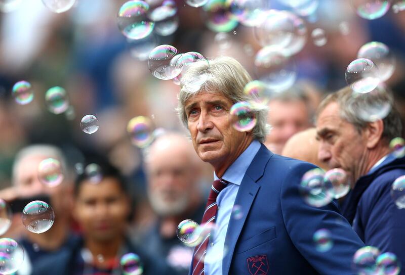 Manuel Pellegrini amid the bubbles as West Ham claimed all three points. Getty Images