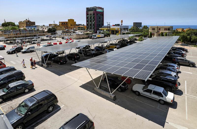 Solar panels cover a shopping mall's car park in the city of Byblos in northern Lebanon.