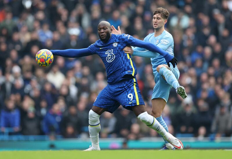 Romelu Lukaku comes under pressure from City defender John Stones. Reuters