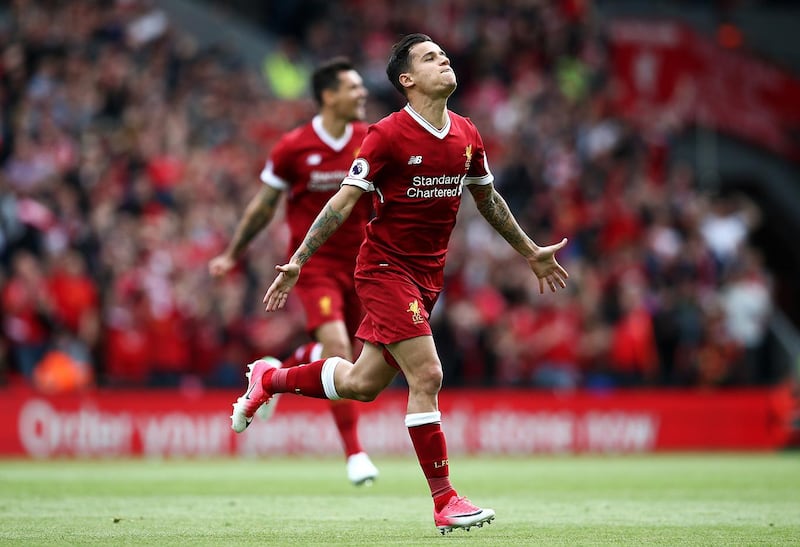 LIVERPOOL, ENGLAND - MAY 21:  Philippe Coutinho of Liverpool celebrates scoring his sides second goal during the Premier League match between Liverpool and Middlesbrough at Anfield on May 21, 2017 in Liverpool, England.  (Photo by Jan Kruger/Getty Images)