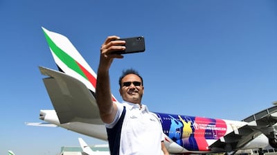 Former Indian opener Virender Sehwag takes a selfie with the Emirates A380. Courtesy Emirates