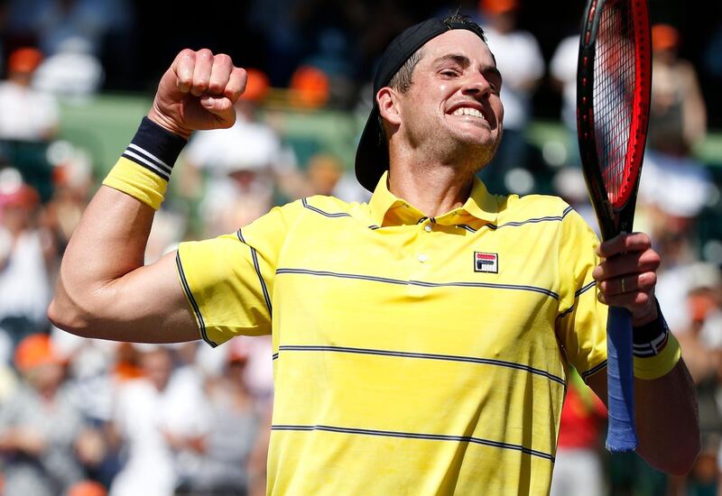 epaselect epa06641166 John Isner of the USA celebrates his win after defeating Alexander Zverev of Germany during their finals match at the Miami Open tennis tournament on Key Biscayne, Miami, Florida, USA, 01 April 2018.  EPA/RHONA WISE