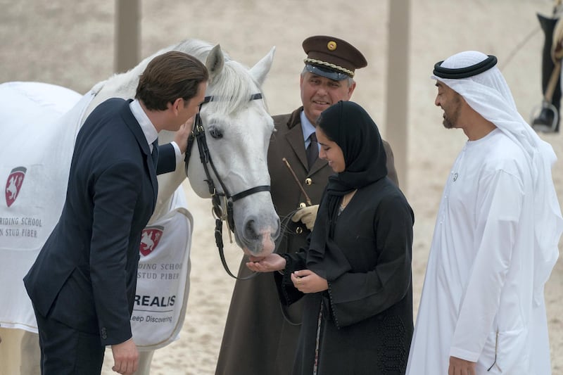 ABU DHABI, UNITED ARAB EMIRATES - March 23, 2019: HH Sheikh Mohamed bin Zayed Al Nahyan, Crown Prince of Abu Dhabi and Deputy Supreme Commander of the UAE Armed Forces (R) and HE Sebastian Kurz, Chancellor of Austria (L), watch an equestrian performance by the Spanish Riding School of Vienna, at Emirates Palace. Seen with HH Sheikha Hassa bint Mohamed bin Zayed Al Nahyan (2nd R).

( Mohamed Al Hammadi / Ministry of Presidential Affairs )
---