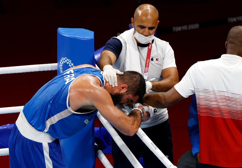Mourad Aliev of France reacts after his disqualification.
