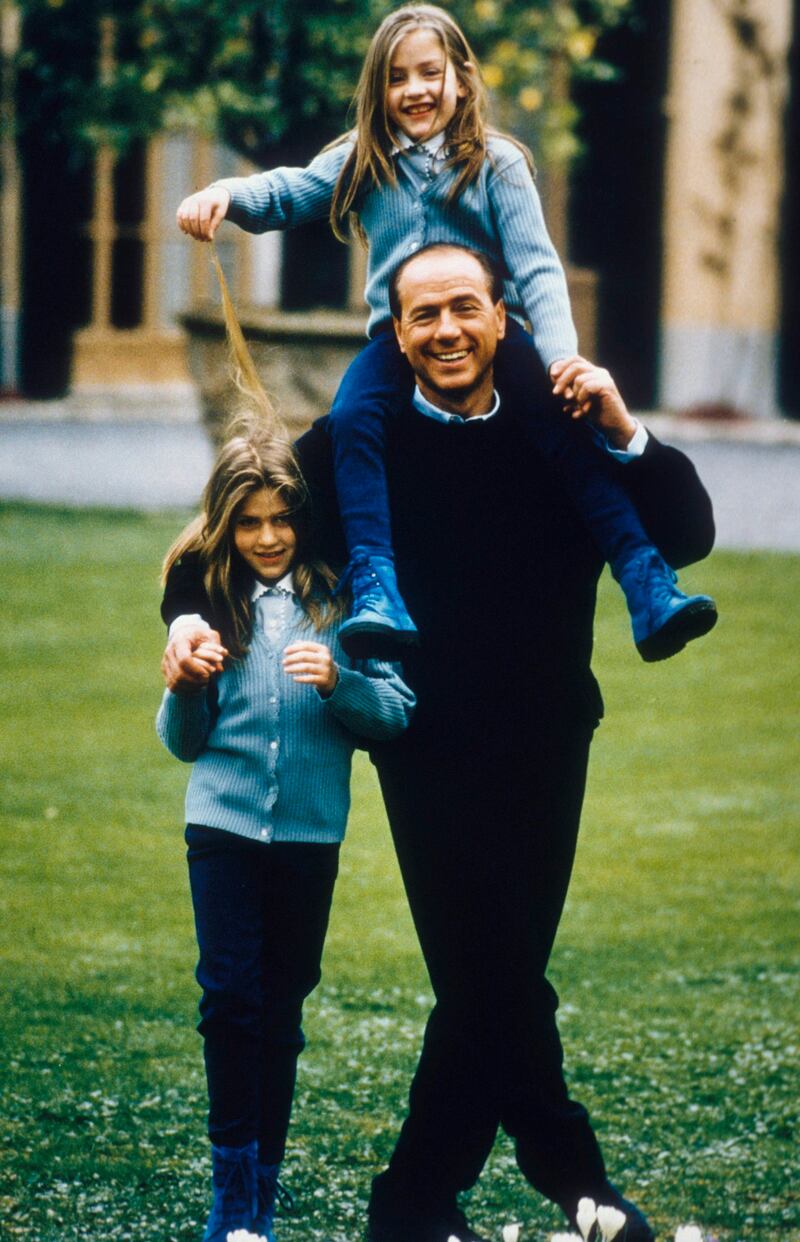 Berlusconi with his daughters Barbara, left, and Eleonora in 1994. Getty
