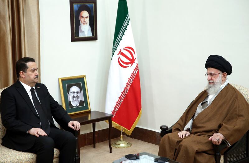 Mr Khamenei meets Iraqi Prime Minister Mohammed Shia Al Sudani. AP