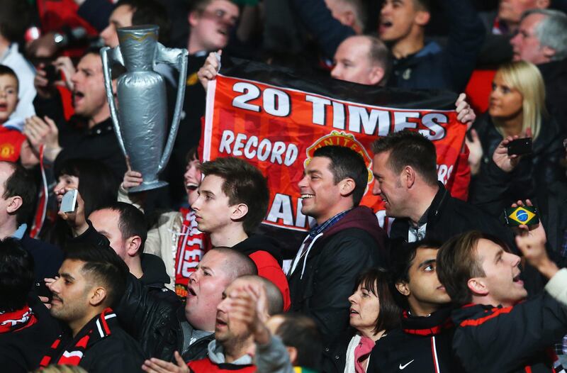 MANCHESTER, ENGLAND - APRIL 22: Manchester United fans display a banner to highlight the 20 league titles the team have won during the Barclays Premier League match between Manchester United and Aston Villa at Old Trafford on April 22, 2013 in Manchester, England.  (Photo by Alex Livesey/Getty Images) *** Local Caption ***  167221682.jpg