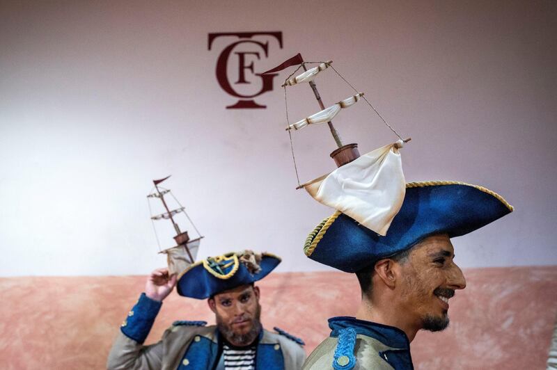 Members from the carnival group 'Los Marea' perform during the qualification stage of the Carnival Groups Contest in Cadiz, Spain. EPA