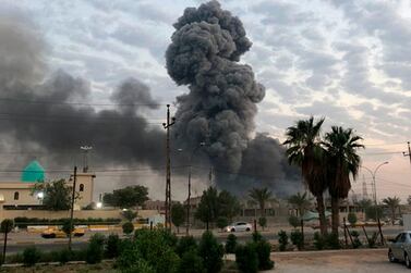 An explosion on August 12 at a Hashed Al Shaabi base southwest of Baghdad, Iraq. AP File