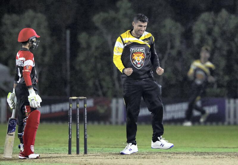 Ajman, United Arab Emirates - Reporter: Paul Radley. Sport. Cricket. Tiger's Babar Iqbal takes the wicket of Panther's Usman Mushtaq during the game between Panthers vs Tigers in the Karwan Rising Stars F40 Final. Thursday, February 11th, 2021. Ajman. Chris Whiteoak / The National