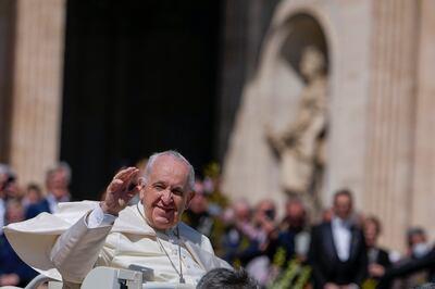 Pope Francis on his popemobile drives through the crowds of worshippers at the end of the Catholic Easter Sunday mass he led in St.  Peter's Square at the Vatican, Sunday, April 17, 2022.  AP Photo