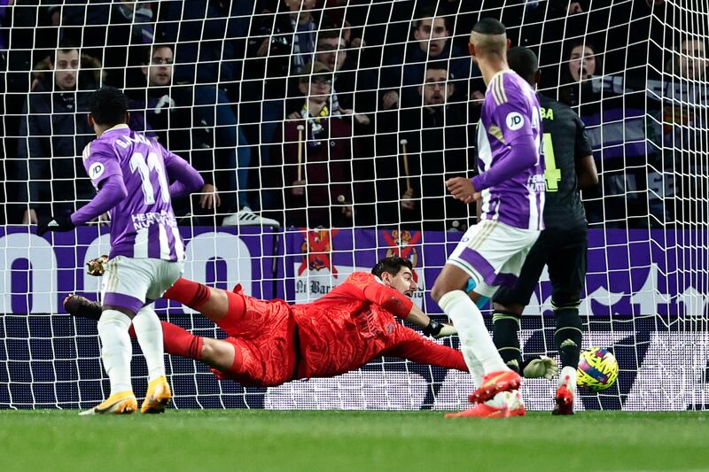 Real Madrid goalkeeper Thibaut Courtois dives to make a save against Valladolid. AP Photo 