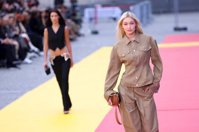 Gigi Hadid presents a look from Stella McCartney's ready-to-wear spring/summer 2023 collection at Paris Fashion Week. AP