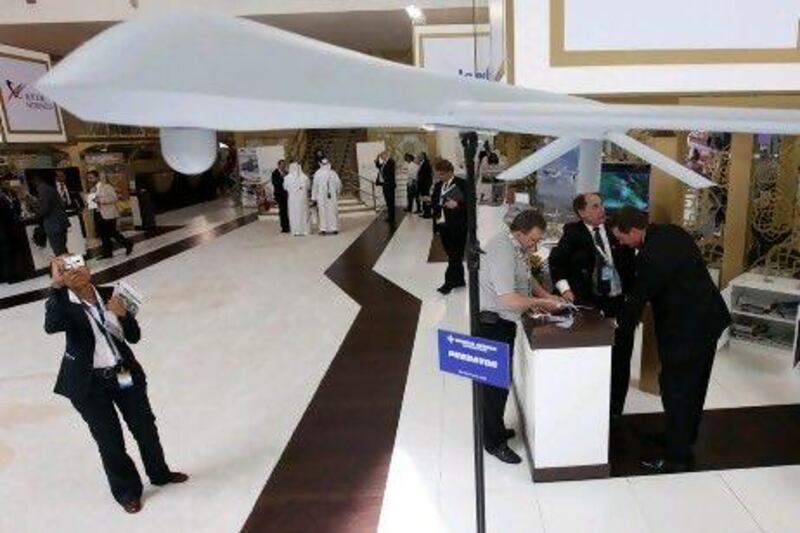 A model of the Predator XP is displayed at the General Atomics Aeronautical booth at Idex.