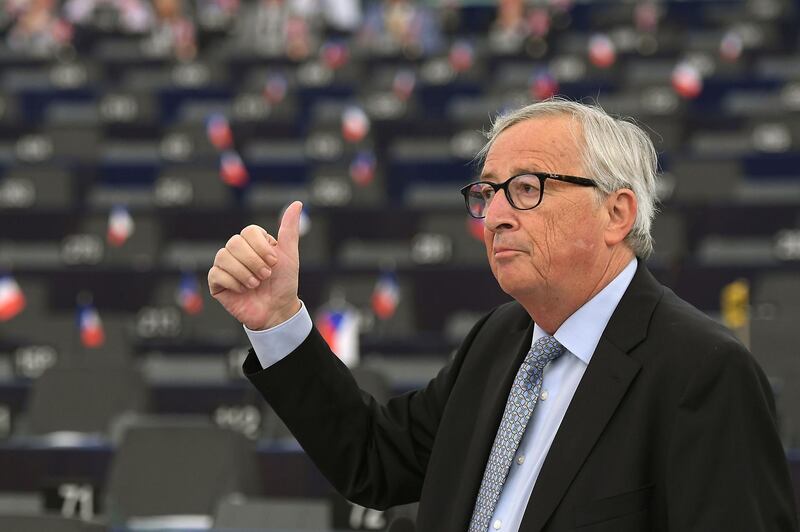 European Commission President Jean-Claude Juncker gives the thumbs up as he speaks during a debate on Brexit at the European Parliament in Strasbourg, northeastern France on September 18, 2019. / AFP / FREDERICK FLORIN
