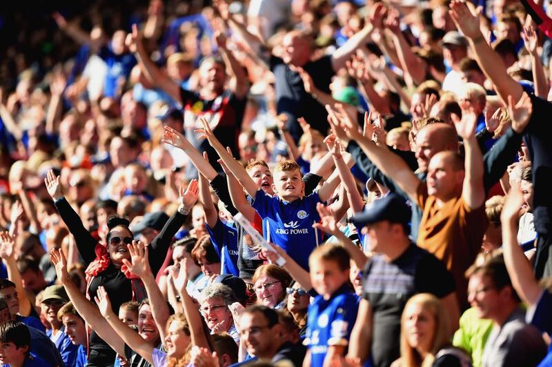 Leicester City fans cheer during their team's match against Arsenal in the Premier League on Sunday. Laurence  Griffiths / Getty Images